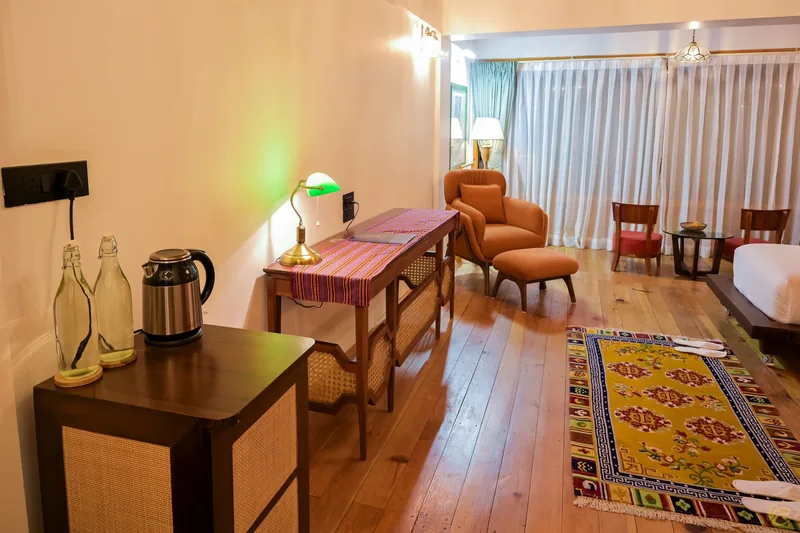 The writing desk, kettle and water bottles kept ready — Timilo Royal Twin, Timilo Boutique